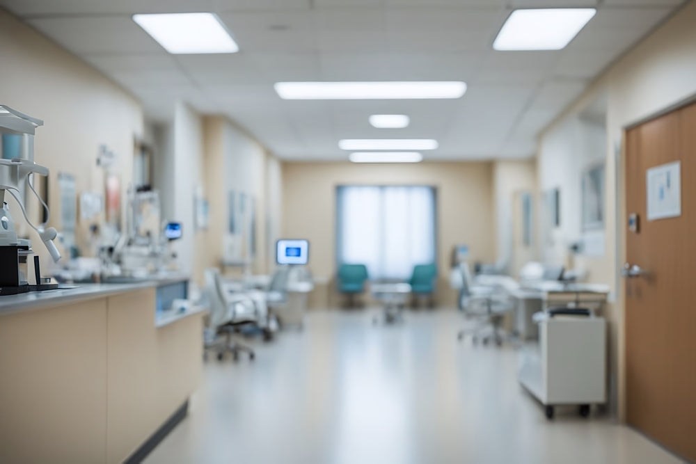 Modern medical clinic interior with medical equipment and empty patient chairs