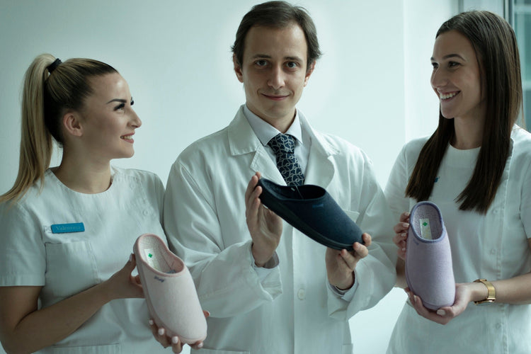 Medical professionals showcasing comfortable healthcare footwear clogs in clinical setting