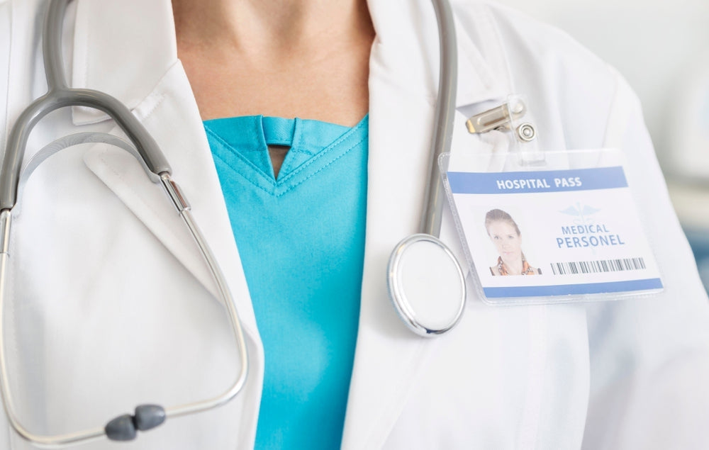 Doctor with stethoscope and hospital ID badge for medical identification supplies