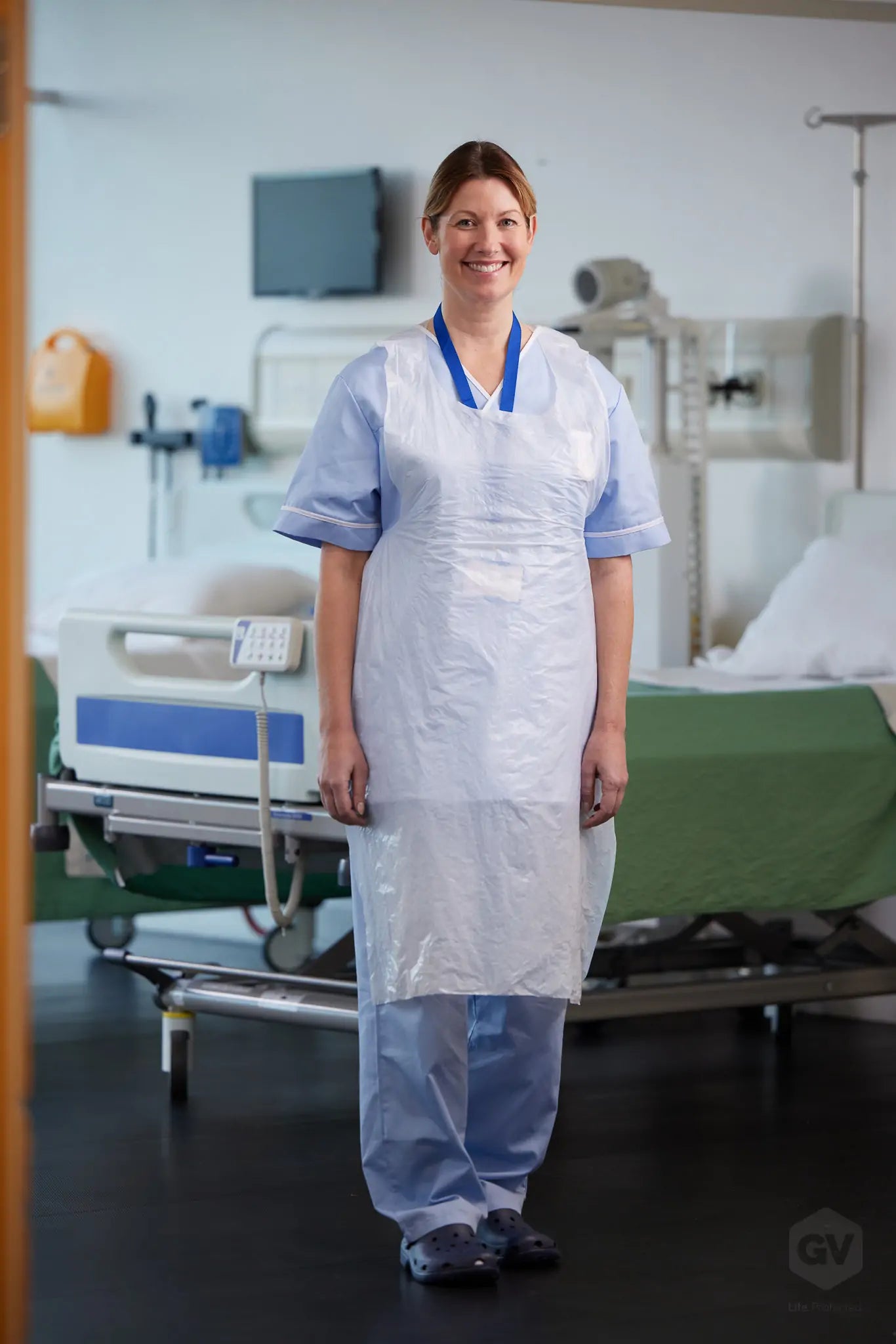 White latex-free healthcare apron by GV Health, roll of 200, designed for medical and clinical use.