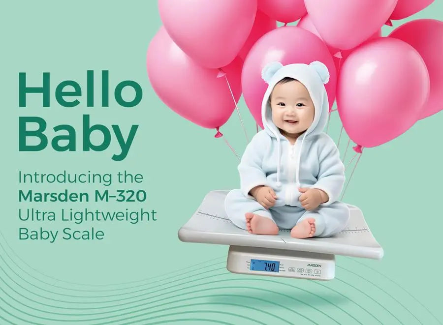 Smiling baby in blue onesie on digital baby scale with pink balloons, Marsden M-320 ultra lightweight baby scale promotion.
