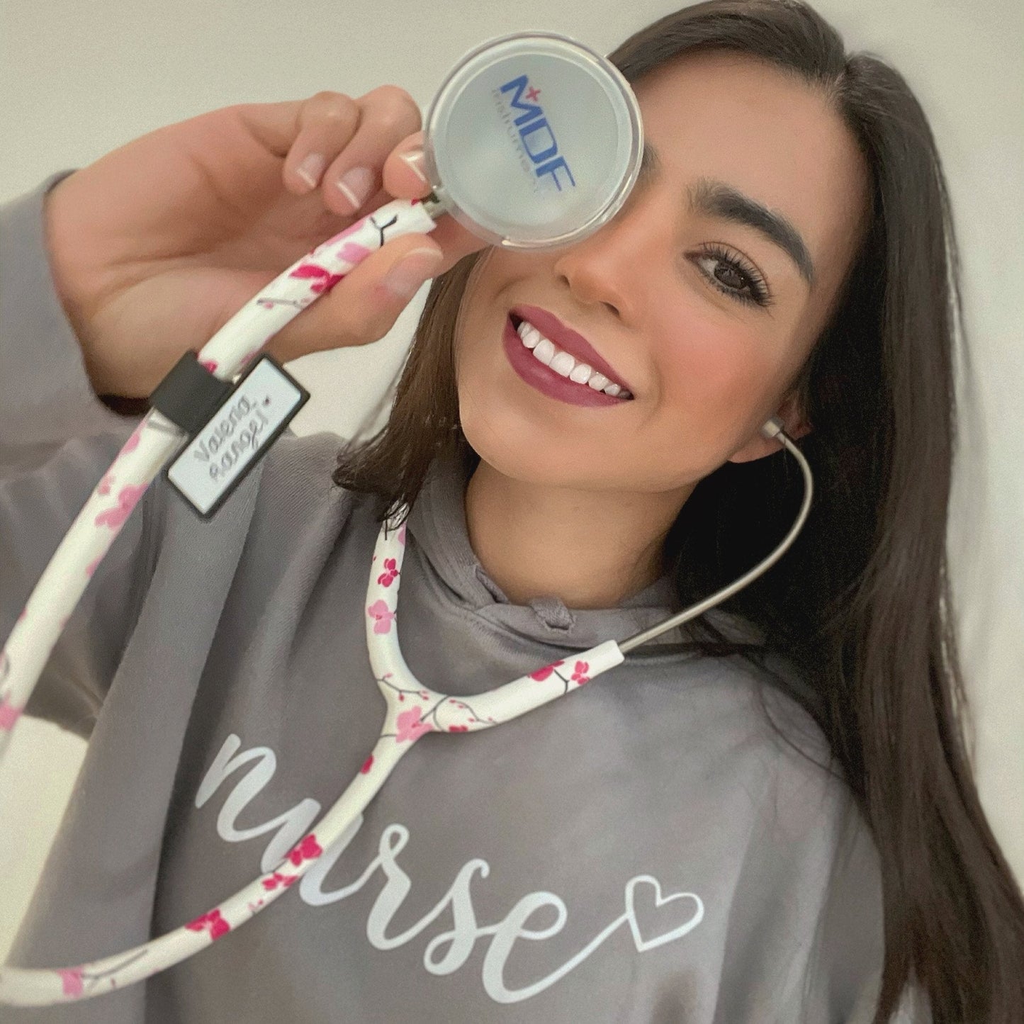 MD One® Epoch® Titanium adult stethoscope in Sakura color with travel case, featuring sleek design and high-quality acoustic components.