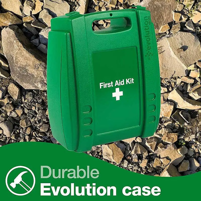 Green Evolution first aid kit case on rocky ground, durable design for medical supplies.