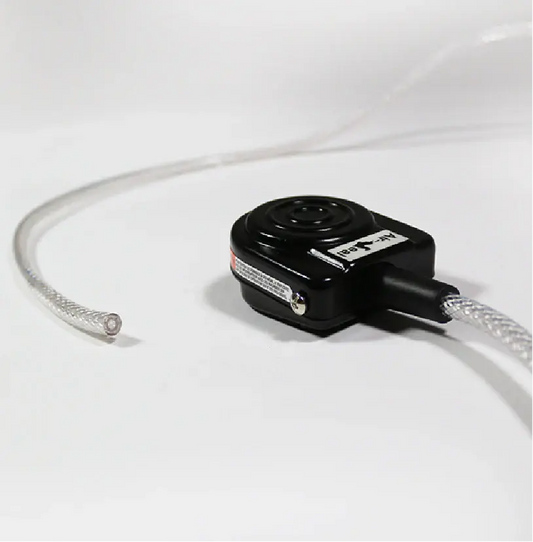 Medical footswitch with clear flexible tubing on a white background
