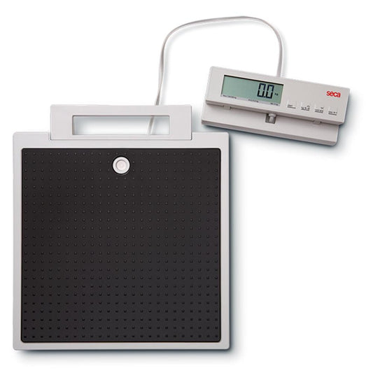 SECA 869 flat scales with cable remote display for non-medical use, showing a digital weighing platform with display unit